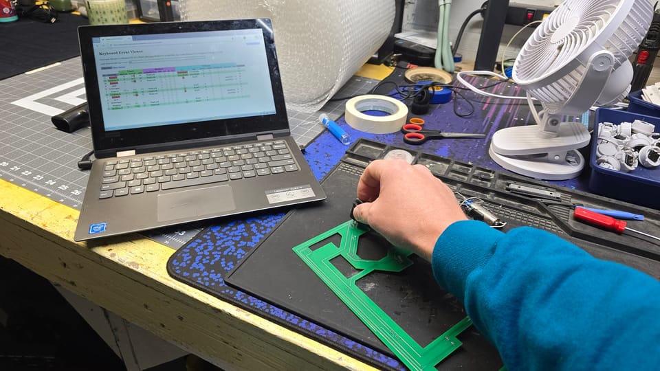 Testing a board on a laptop that shows each key press
