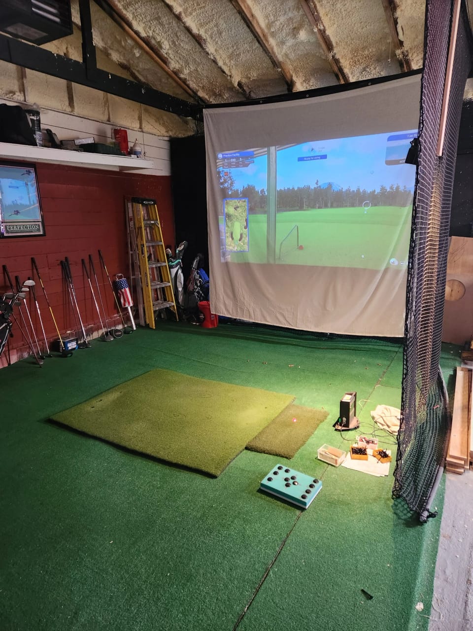 The golf simulator bay in the shop